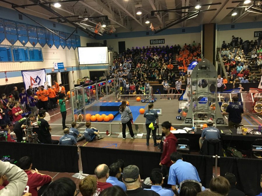 "The Stands," shown above, is where each match is held. Two teams of three robots each compete in the center by tossing balls, placing hatches, and climbing pedestals. 