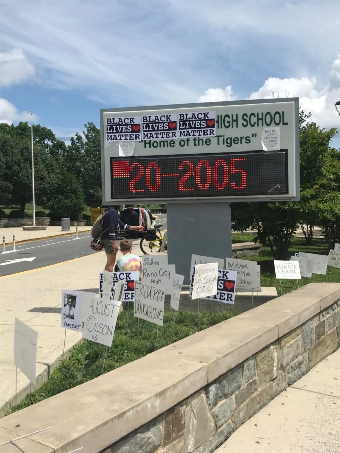 One hundred gather in front of Wilson as support for name change skyrockets