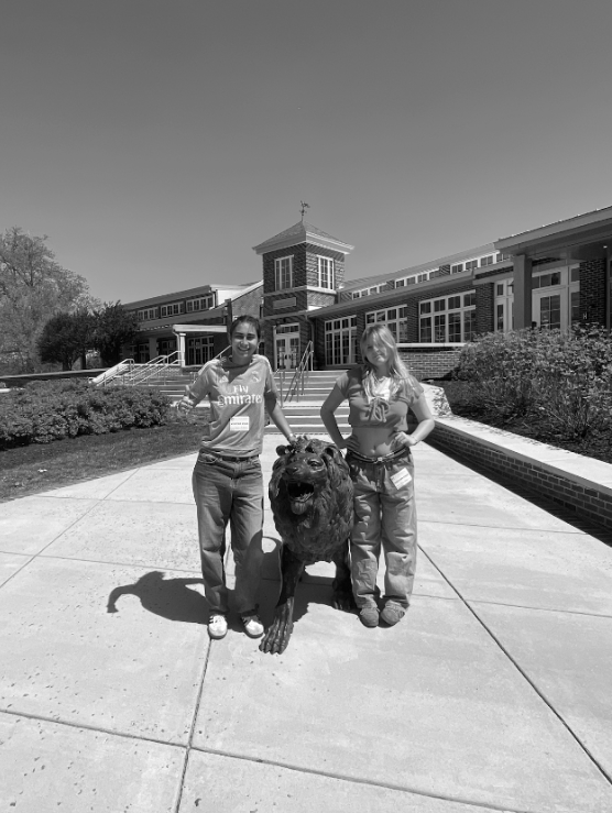 SUPRISING ST.ANDREWS - Francesca and Becca pose in front of the St. Andrew’s Lion. The duo was shocked by the culture and amenities of the institution. 