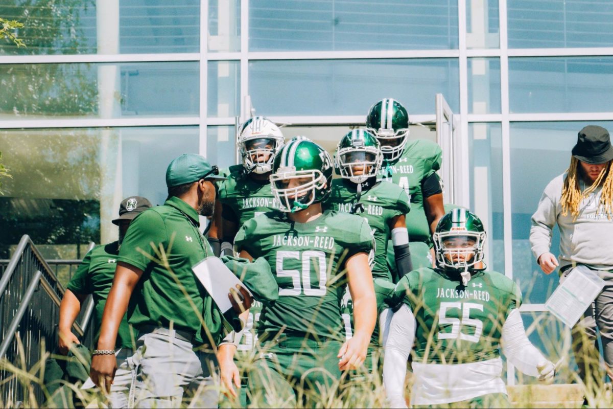 SATURDAY NOON KICKOFF: The Tigers take the field just ahead of their week four matchup against St. Albans. 