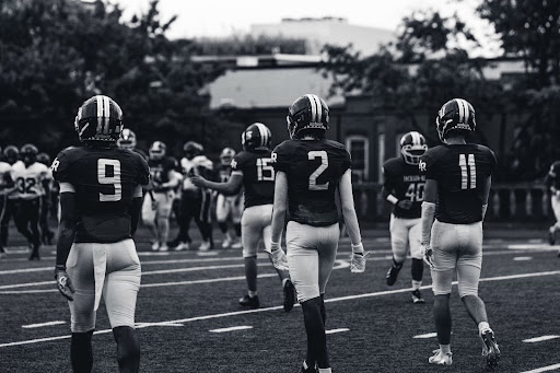 FRIDAY NIGHT LIGHTS AT CARDOZO - L to R: #9 Cam Butler, #2 Mnason Wilson and #11 Brody
Ryan.