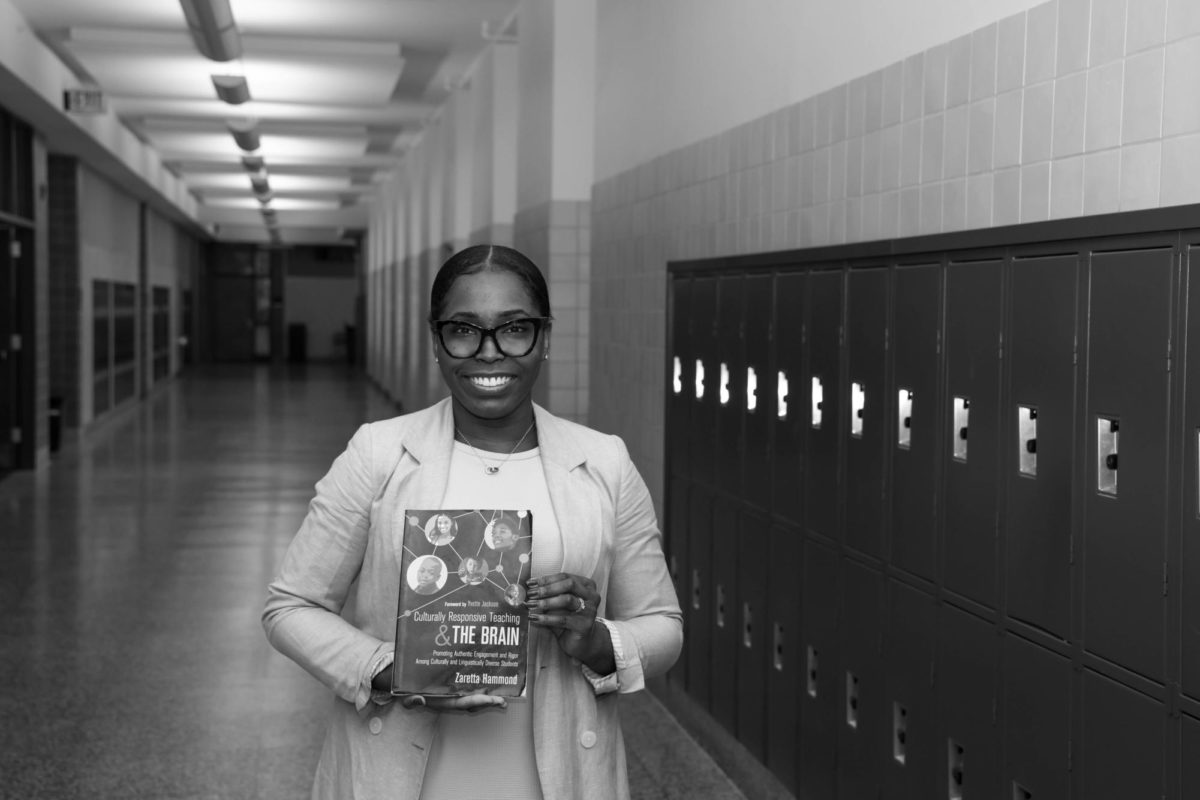 SMILING STAFF - Above is Porshia Ojigbo posing candidly for the camera. She has joined the JR staff this year.