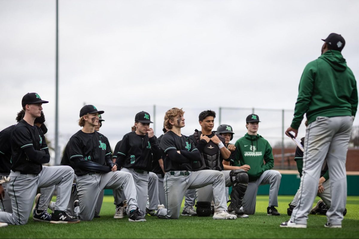 CHASING MILESTONES: The Tigers having a postgame debrief after a scrimmage against Gonzaga from March 2. 