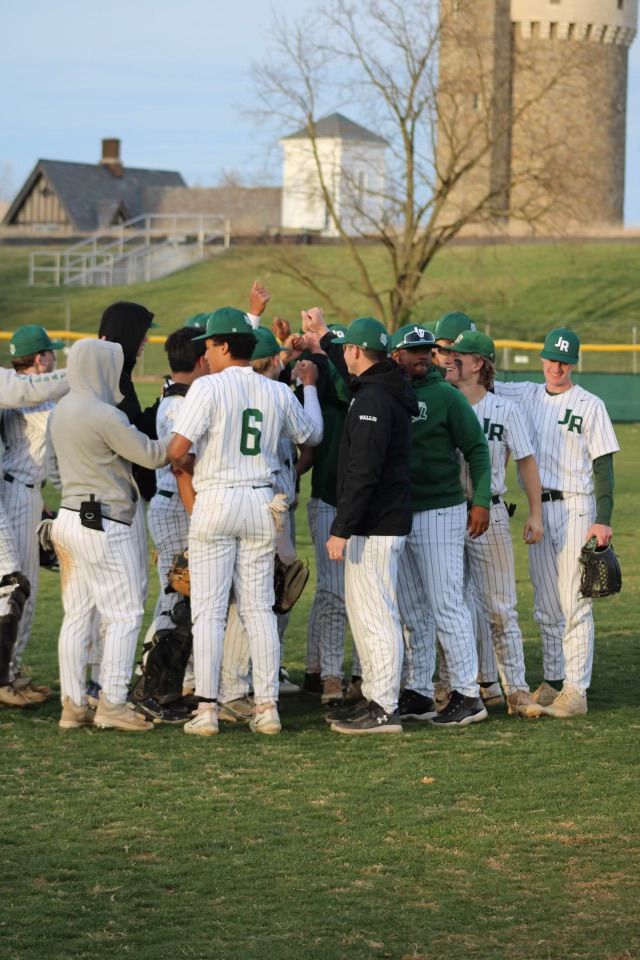 ONE TEAM: The Tigers postgame following their win against Sidwell Friends at Fort Reno Park on Tuesday. 